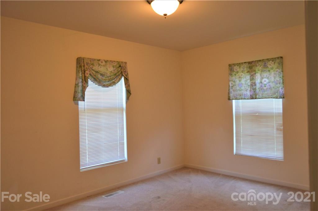 10835 Cool Springs Road Woodleaf, NC 27054 - Photo 14 of 35 a view of an empty room with a window