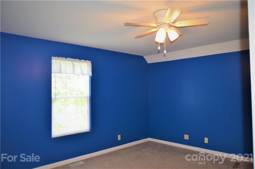 10835 Cool Springs Road Woodleaf, NC 27054 - Photo 20 of 35 an empty room with a window