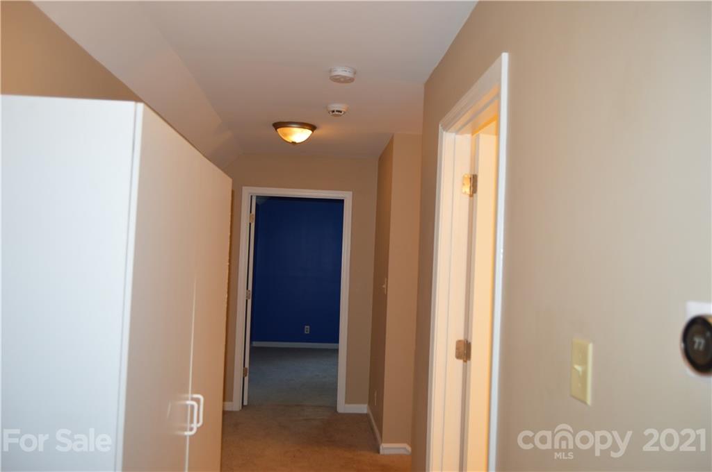 10835 Cool Springs Road Woodleaf, NC 27054 - Photo 22 of 35 a view of an empty room