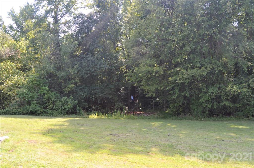10835 Cool Springs Road Woodleaf, NC 27054 - Photo 33 of 35 a view of a swimming pool with an outdoor space