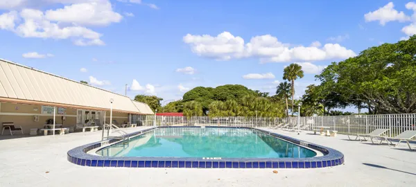 a view of outdoor space swimming pool and outdoor seating
