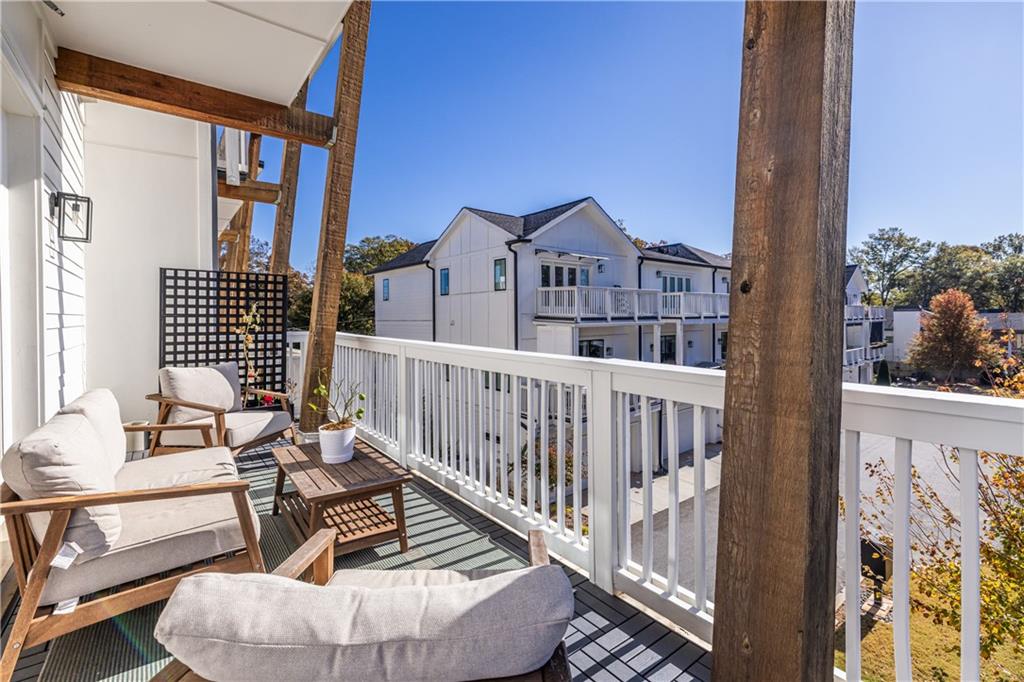 812 West College Avenue Decatur, GA 30030 - Photo 13 of 32 a view of a balcony with two chairs and a table