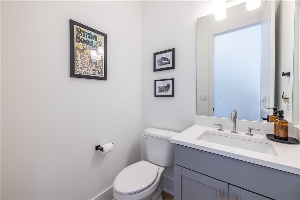 812 West College Avenue Decatur, GA 30030 - Photo 20 of 32 a bathroom with a sink mirror and toilet