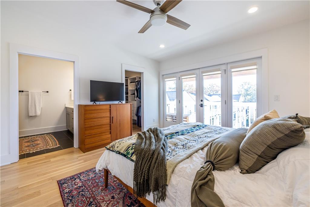 812 West College Avenue Decatur, GA 30030 - Photo 21 of 32 a bedroom with a bed and a television