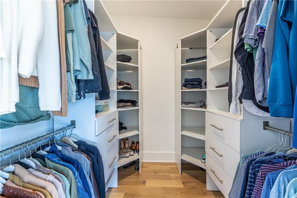 812 West College Avenue Decatur, GA 30030 - Photo 25 of 32 a view of walk in closet with clothes and shoes