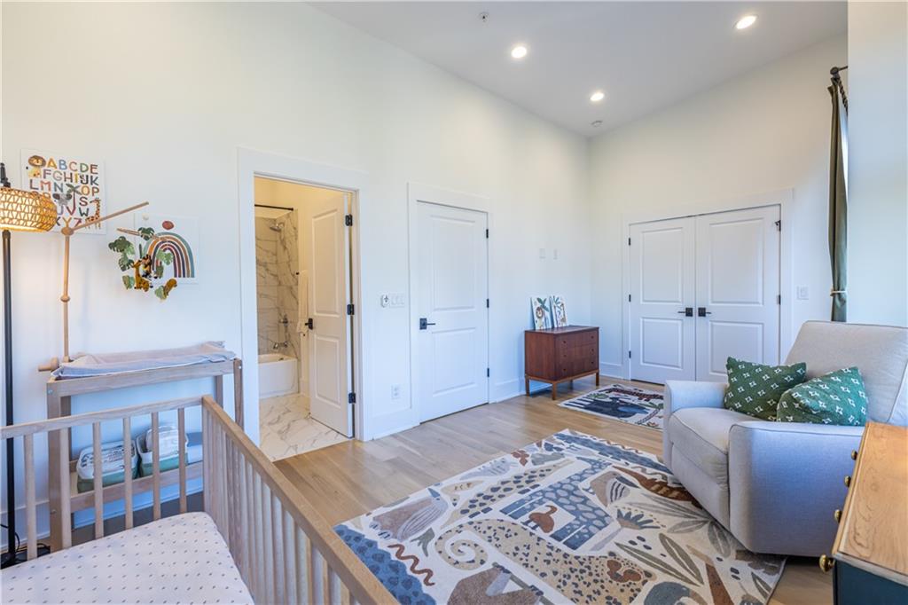 812 West College Avenue Decatur, GA 30030 - Photo 26 of 32 a bedroom with furniture and a rug