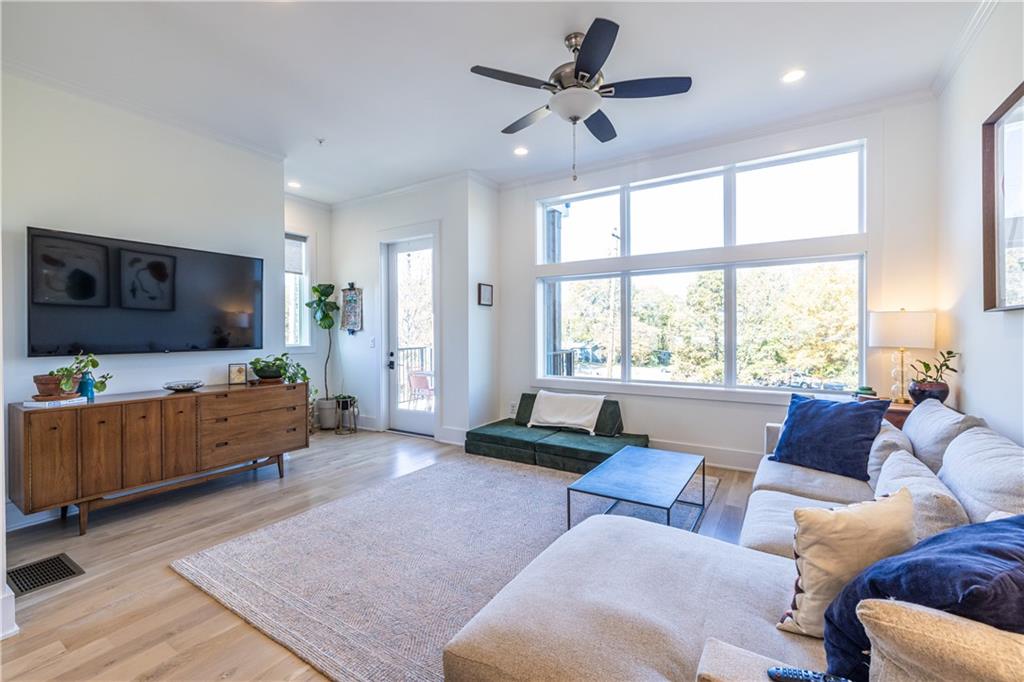 812 West College Avenue Decatur, GA 30030 - Photo 3 of 32 a living room with furniture and a flat screen tv