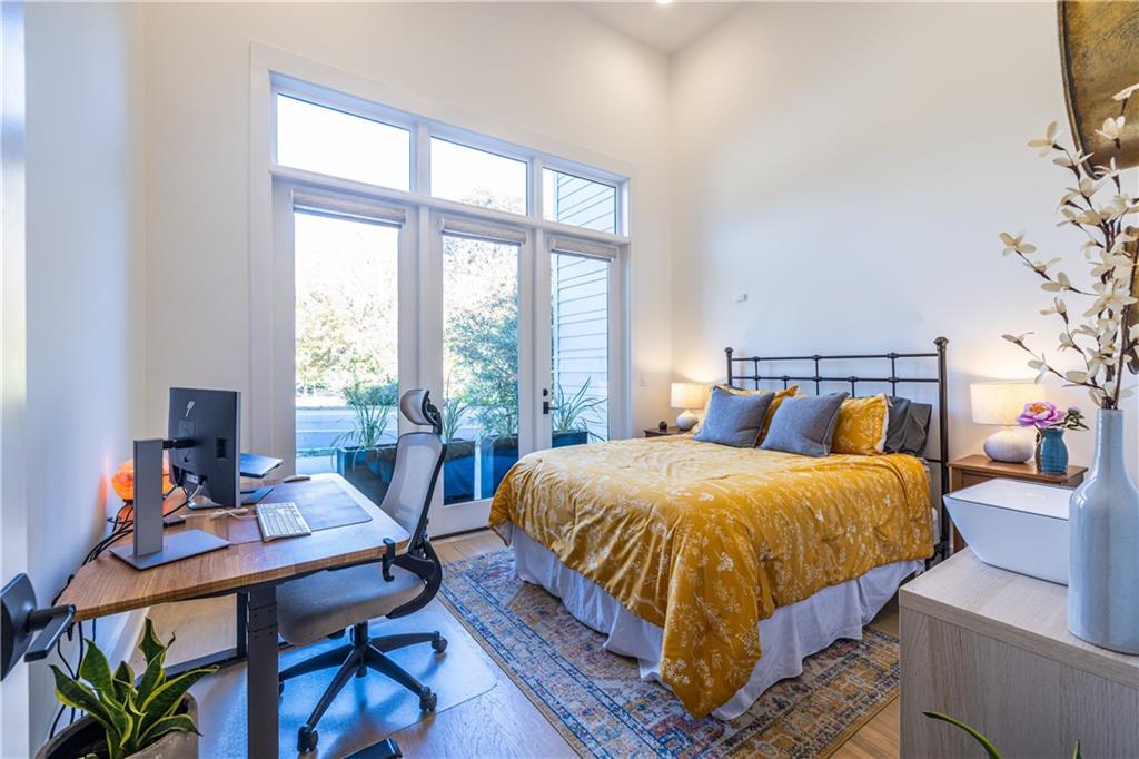 812 West College Avenue Decatur, GA 30030 - Photo 9 of 32 a bed sitting in a bedroom next to a window