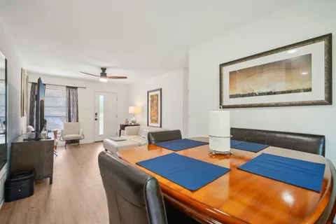 a view of a livingroom with furniture and window