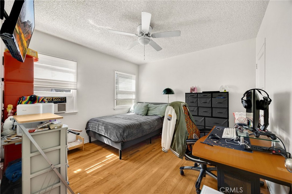 4577 Ranger Avenue El Monte, CA 91731 - Photo 21 of 25 a bedroom with furniture and a window