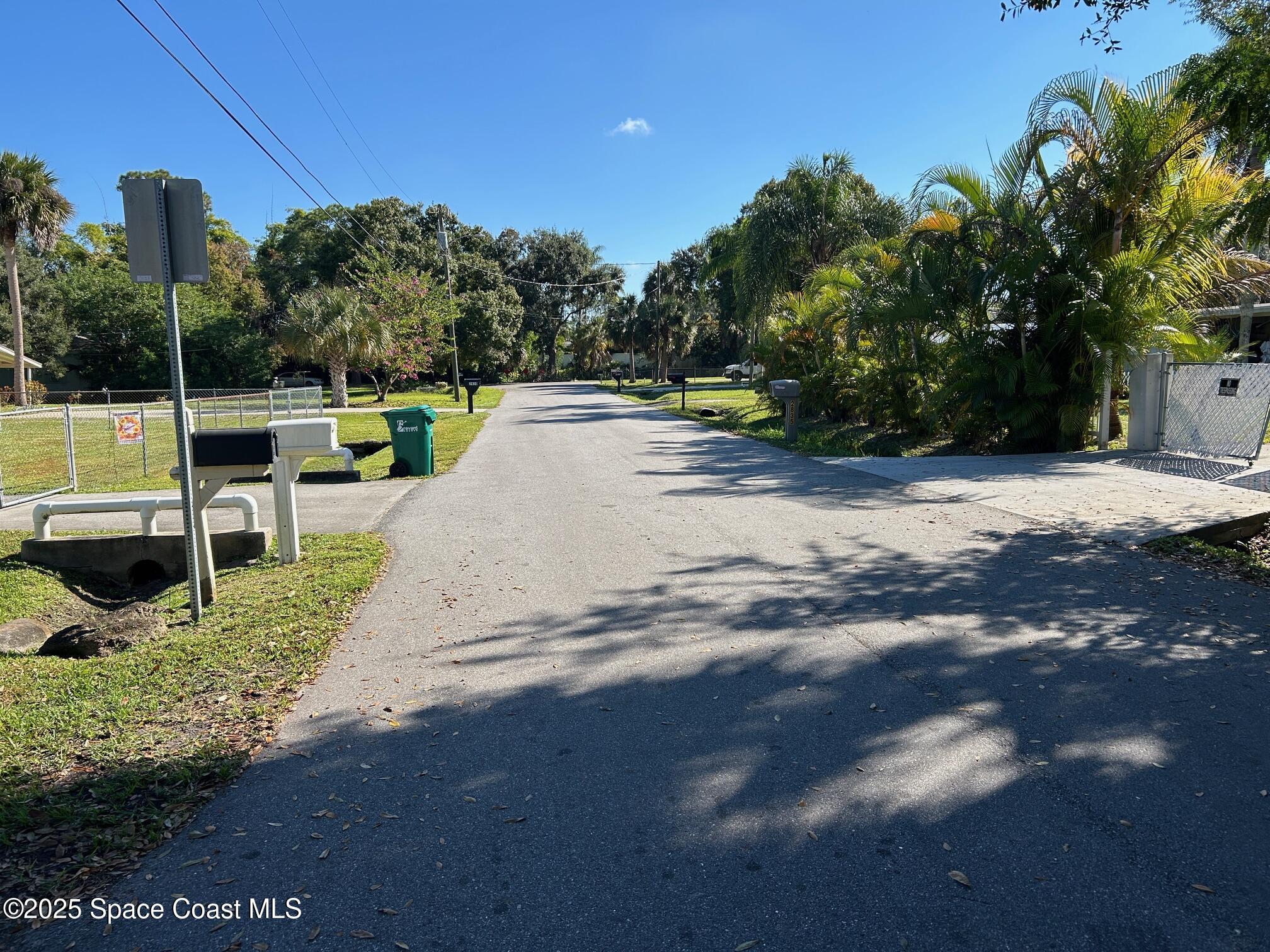 2845 Sunset Road Melbourne, FL 32904 - Photo 2 of 13 a view of a park with large trees