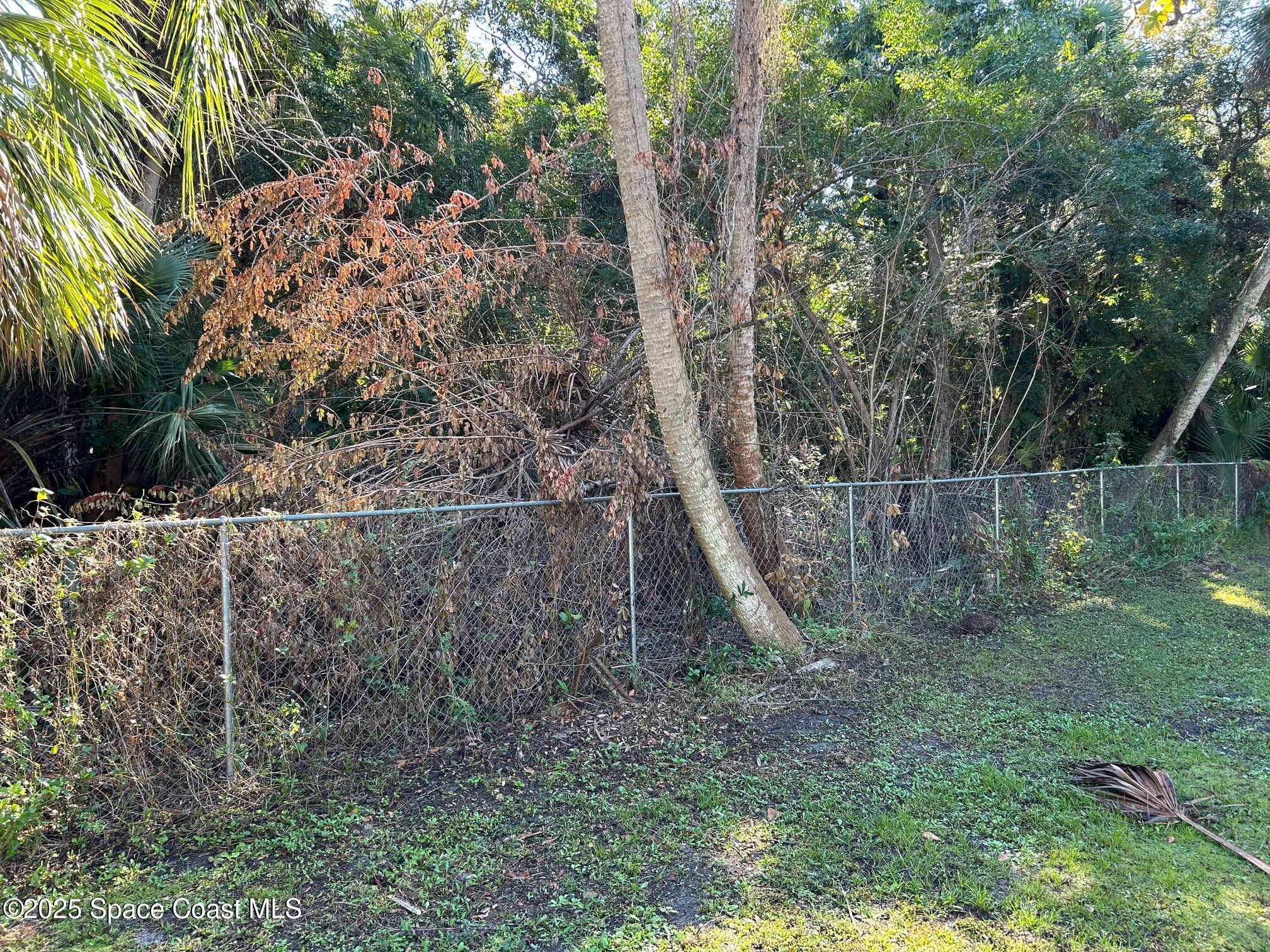 2845 Sunset Road Melbourne, FL 32904 - Photo 4 of 13 a view of a backyard