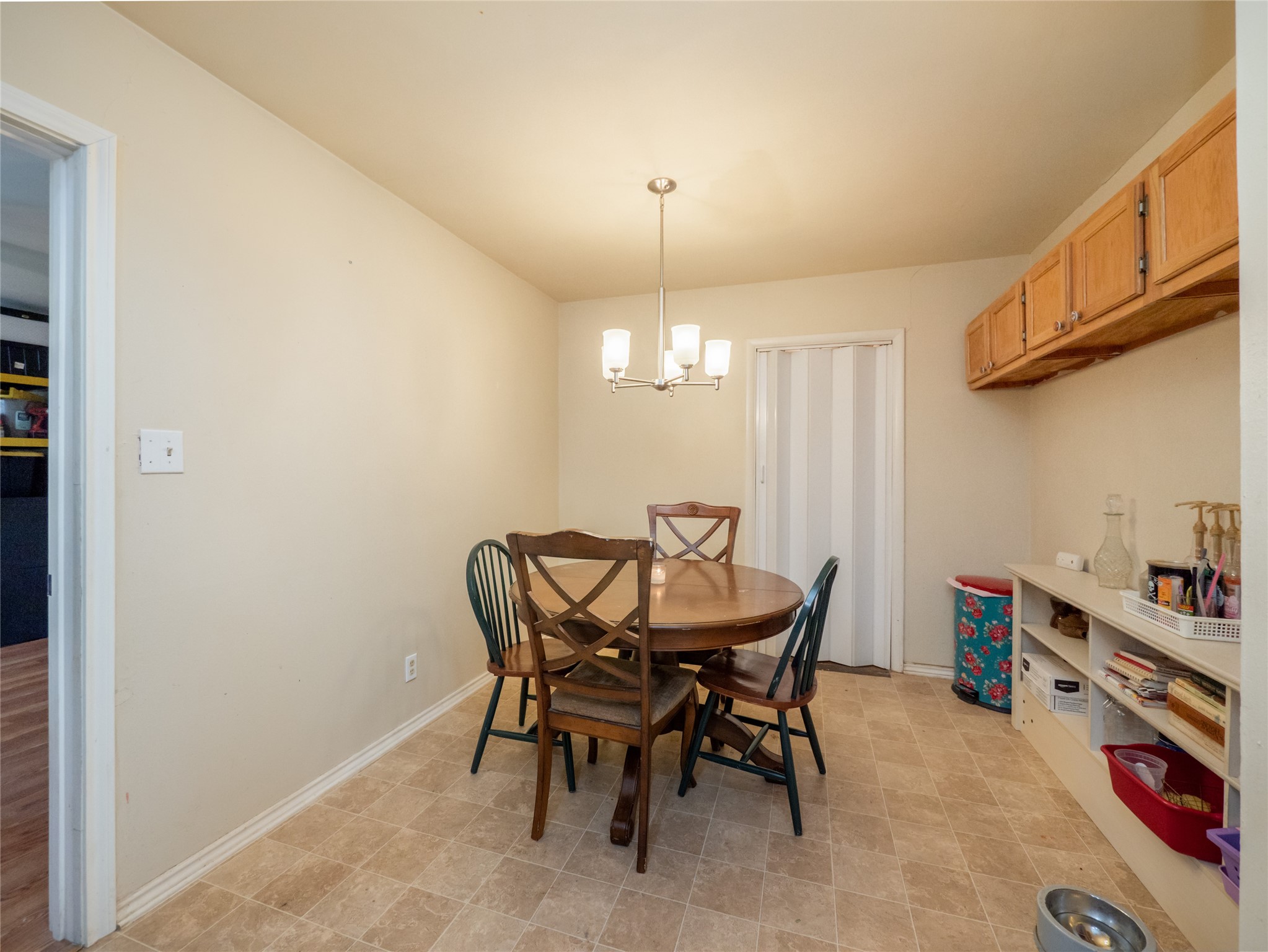 1910 South 13th Street Temple, TX 76504 - Photo 11 of 35 a view of a dining room with furniture and chandelier