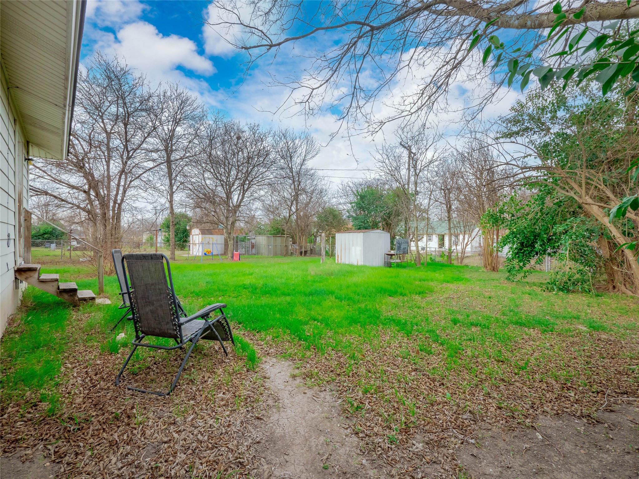 1910 South 13th Street Temple, TX 76504 - Photo 31 of 35 a view of a chair and table in the garden