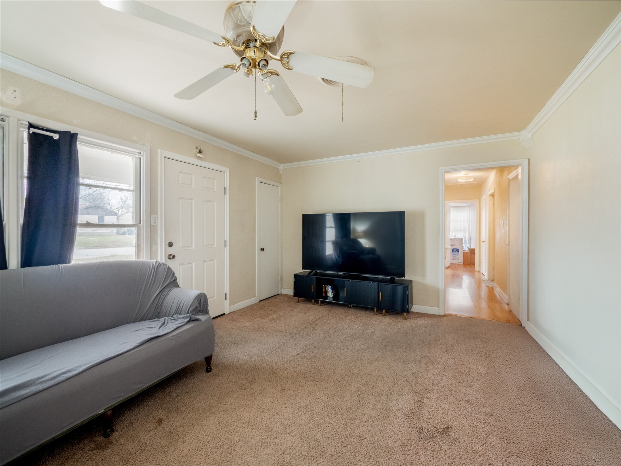 1910 South 13th Street Temple, TX 76504 - Photo 4 of 35 a living room with furniture and a flat screen tv