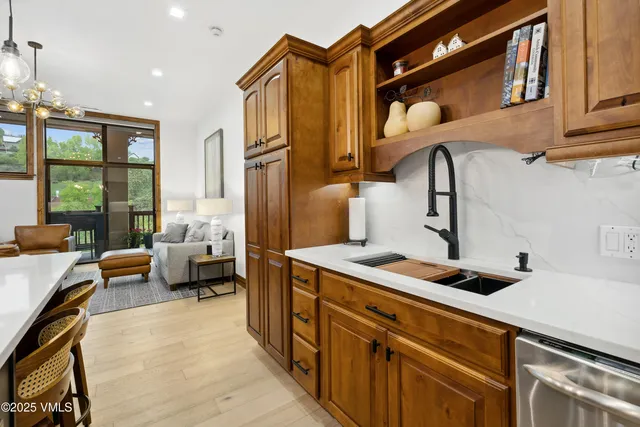 a bathroom with a shower and a sink