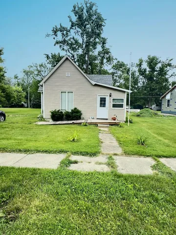 a house view with a garden space