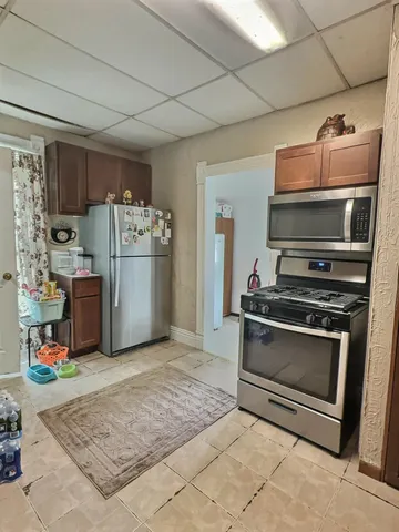 a bathroom with a toilet a sink and a shower
