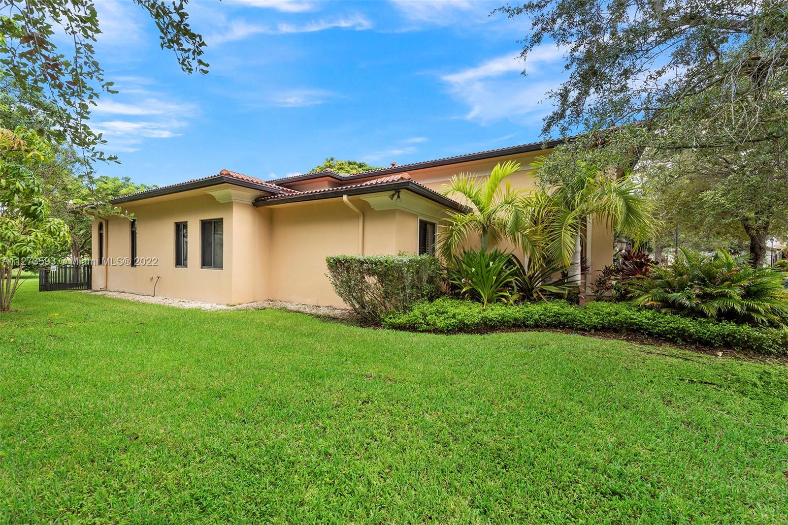 11411 Smathers Circle Pinecrest, FL 33156 - Photo 34 of 44 a view of a house with a yard