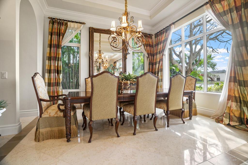 17542 Grand Este Way Boca Raton, FL 33496 - Photo 14 of 45 a view of a dining room with furniture window and outside view