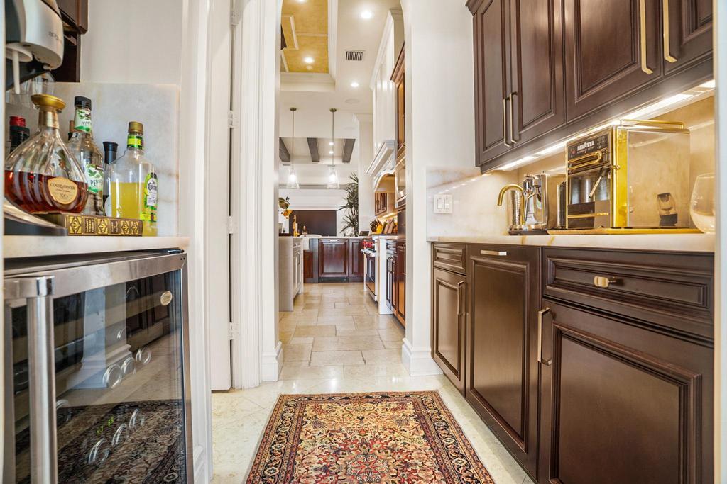 17542 Grand Este Way Boca Raton, FL 33496 - Photo 24 of 45 a kitchen with stainless steel appliances granite countertop a stove and a sink