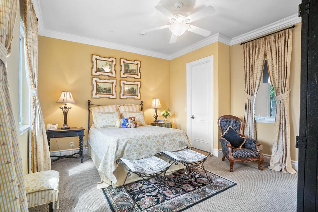 17542 Grand Este Way Boca Raton, FL 33496 - Photo 37 of 45 a bedroom with a bed and wooden floor