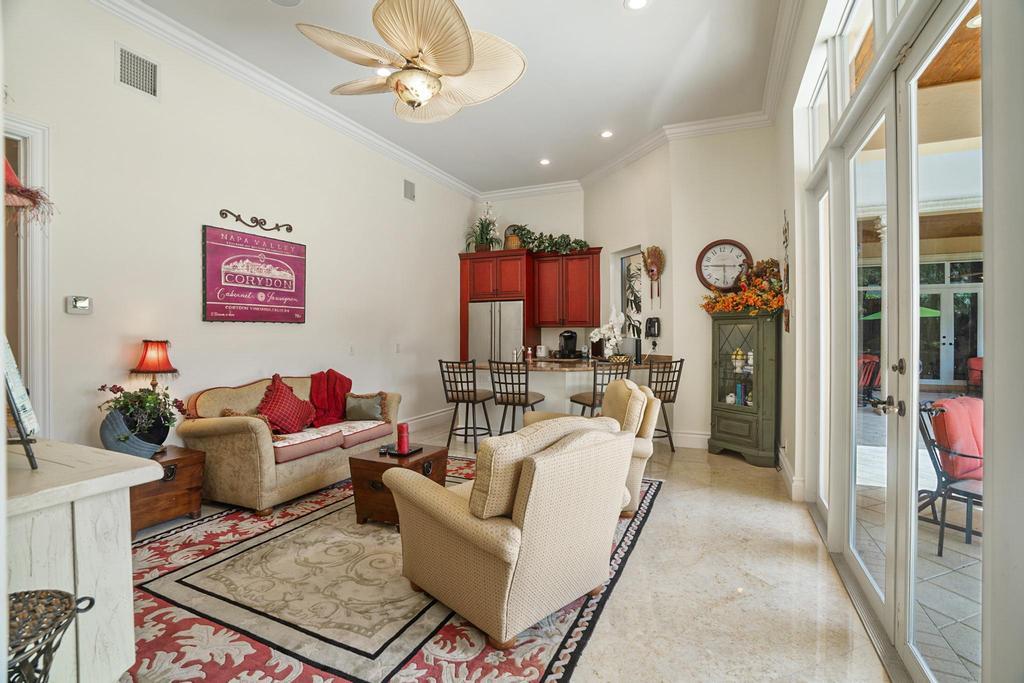 17542 Grand Este Way Boca Raton, FL 33496 - Photo 41 of 45 a living room with furniture and a window