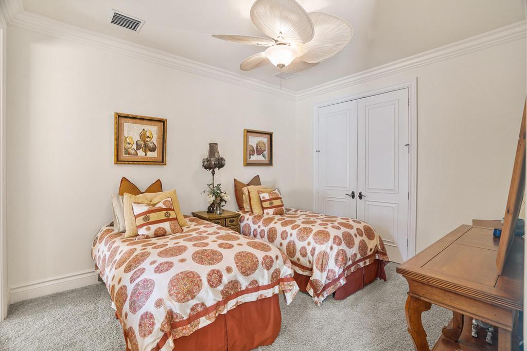 17542 Grand Este Way Boca Raton, FL 33496 - Photo 42 of 45 a bedroom with two beds and a lamp