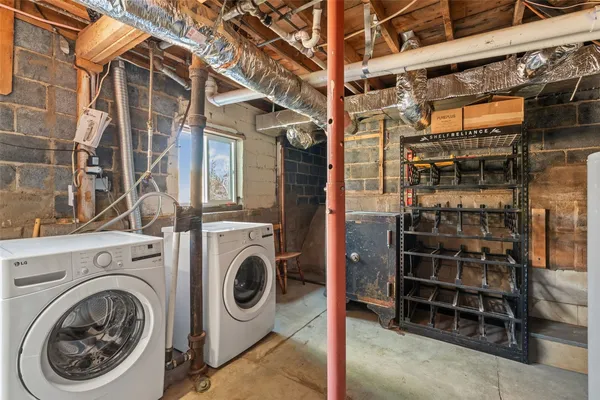 a view of yard covered with snow in front of house