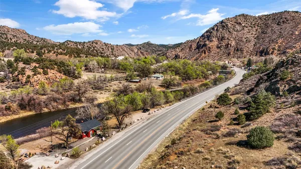 a view of a yard with trees