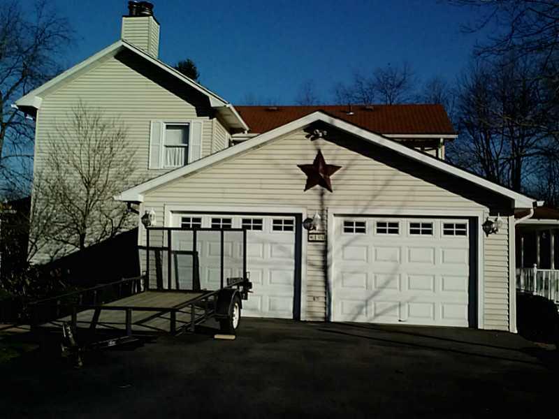 190 Love Road Valencia, PA 16059 - Photo 24 of 24 Parking Lot/Garage. LOW MAINTENANCE ASPHALT DRIVEWAY TO YOUR TWO CAR ATTACHED GARAGE AND ADDITIONAL PARKING PAD.