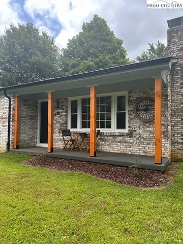 a view of a porch with a potted plants