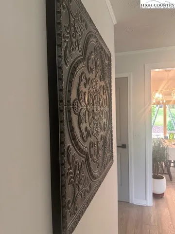 a view of a door and tree in a patio