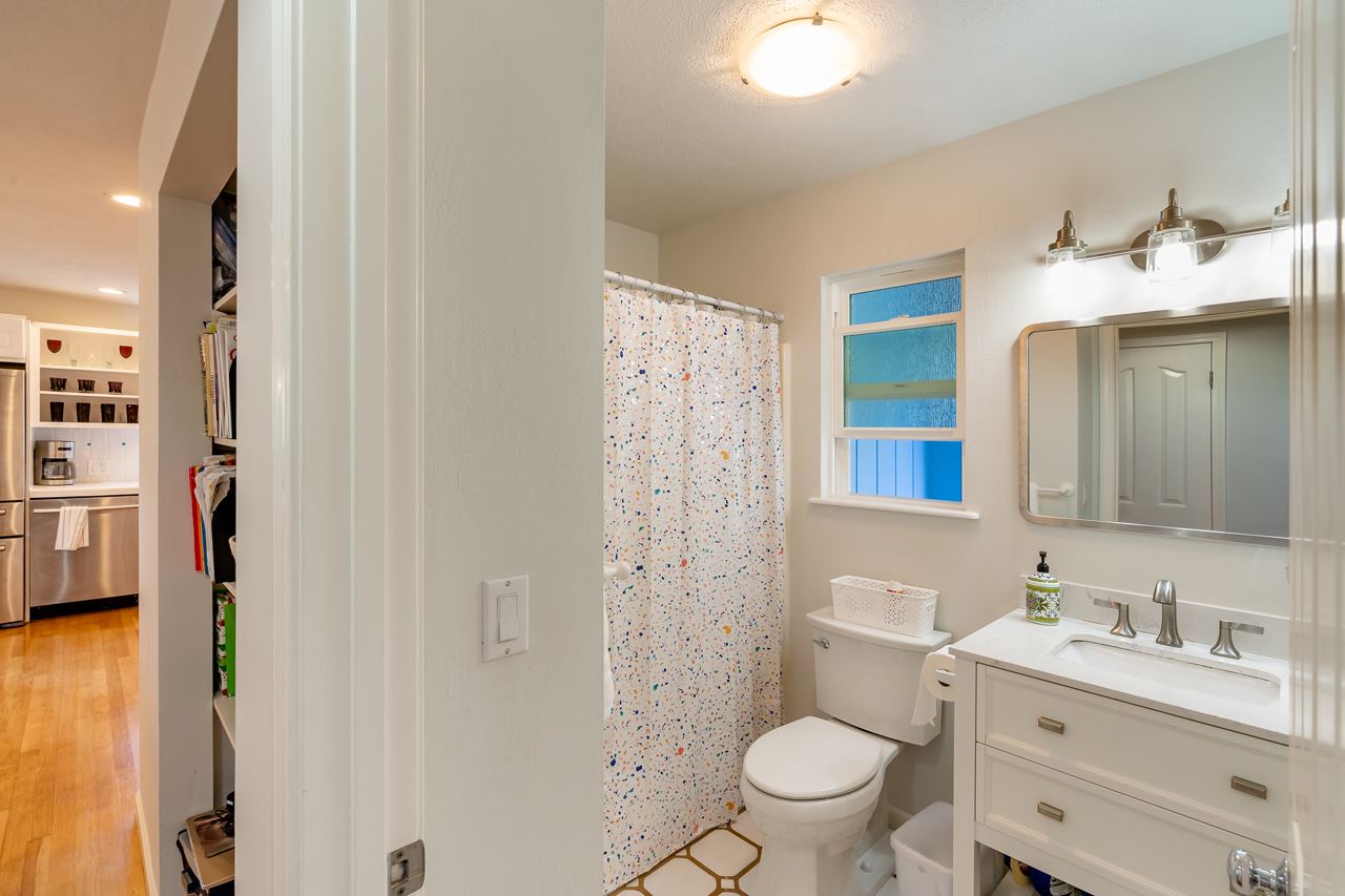 467 Ulumalu Road Haiku, HI 96708 - Photo 23 of 30 a bathroom with a sink a toilet a shower and a mirror