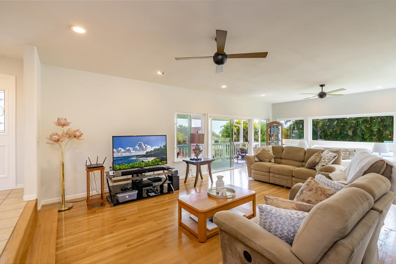467 Ulumalu Road Haiku, HI 96708 - Photo 3 of 30 a living room with furniture and a flat screen tv