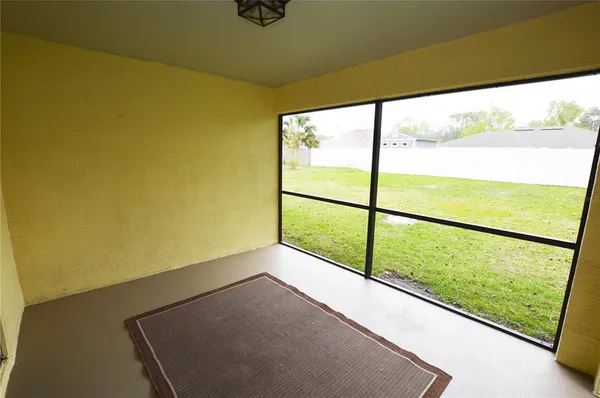 a view of an empty room and window