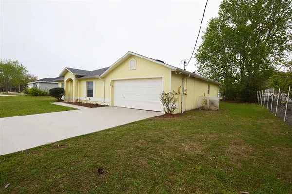 a view of outdoor space yard and garage