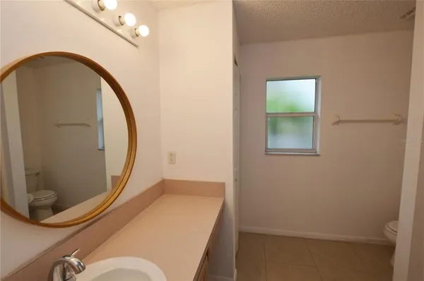 a view of a hallway with a mirror