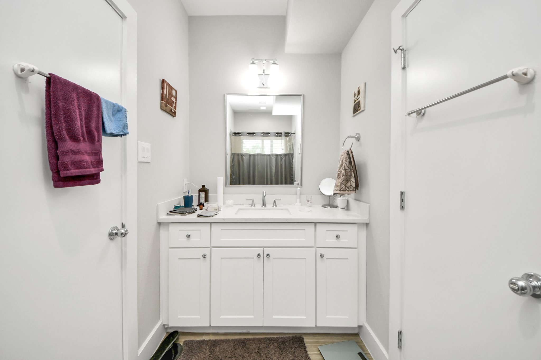6715 Allegheny Street Houston, TX 77021 - Photo 15 of 18 a bathroom with a sink and a mirror