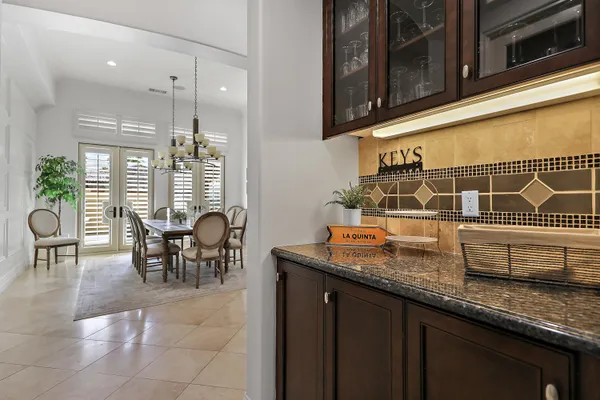 a view of a patio with swimming pool
