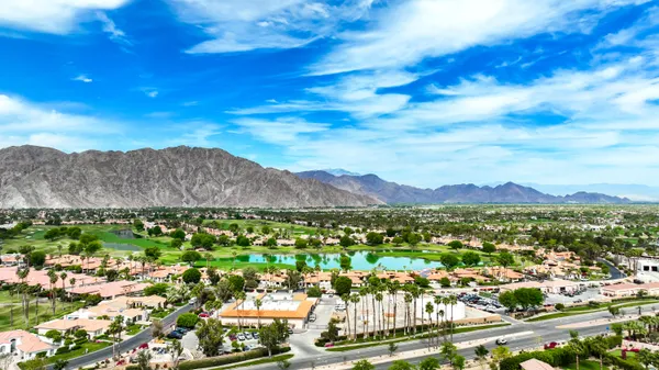 a view of a garden with an outdoor space