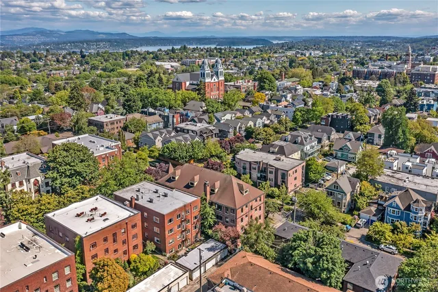 an aerial view of a city with lots of residential buildings