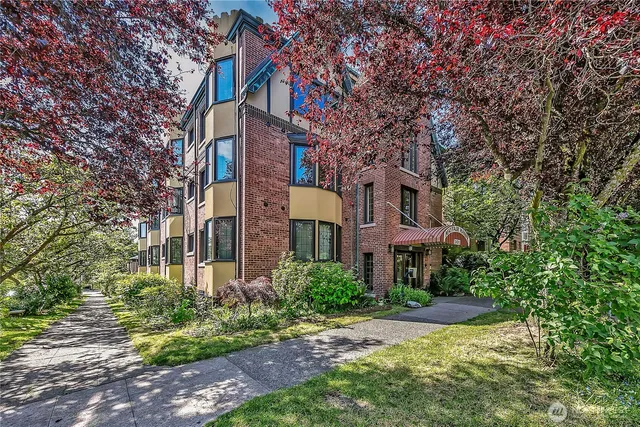 a front view of a multi story residential apartment buildings