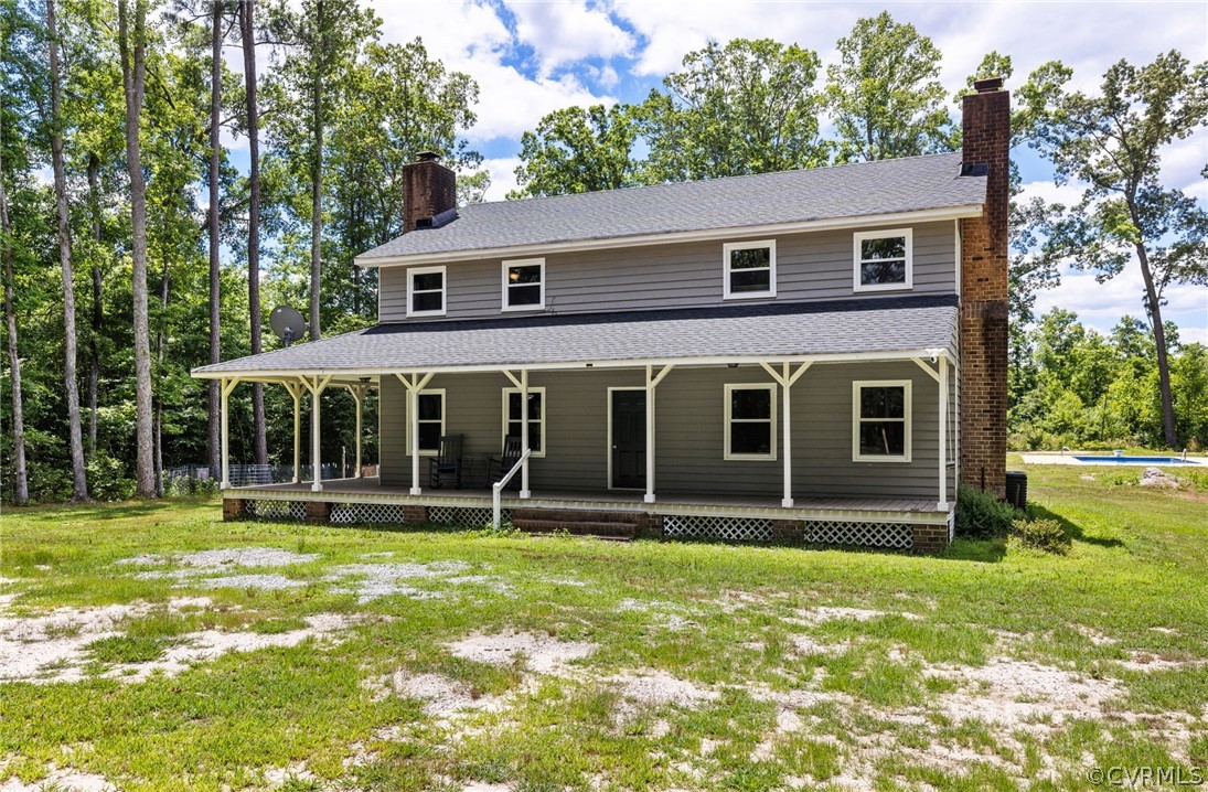 6621 Cox Road Wilsons, VA 23894 - Photo 1 of 44 a front view of a house with a yard