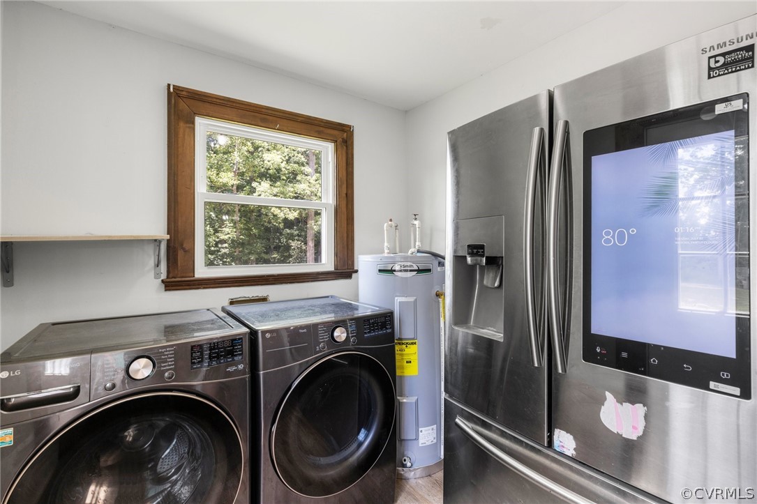 6621 Cox Road Wilsons, VA 23894 - Photo 19 of 44 a utility room with dryer and washer