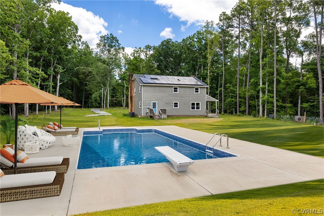 6621 Cox Road Wilsons, VA 23894 - Photo 2 of 44 a view of a house with swimming pool and yard