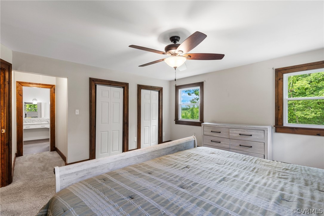 6621 Cox Road Wilsons, VA 23894 - Photo 27 of 44 a bedroom with a bed and a large window