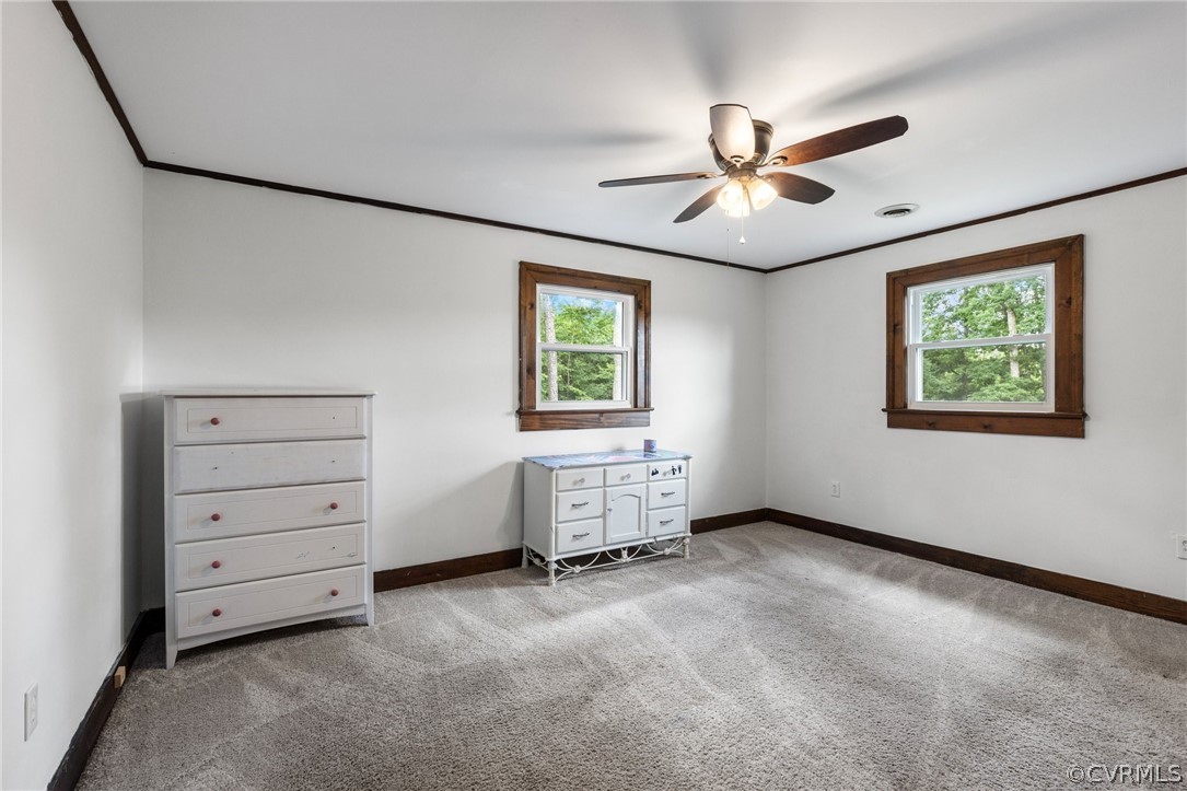 6621 Cox Road Wilsons, VA 23894 - Photo 29 of 44 a view of an empty room with a window
