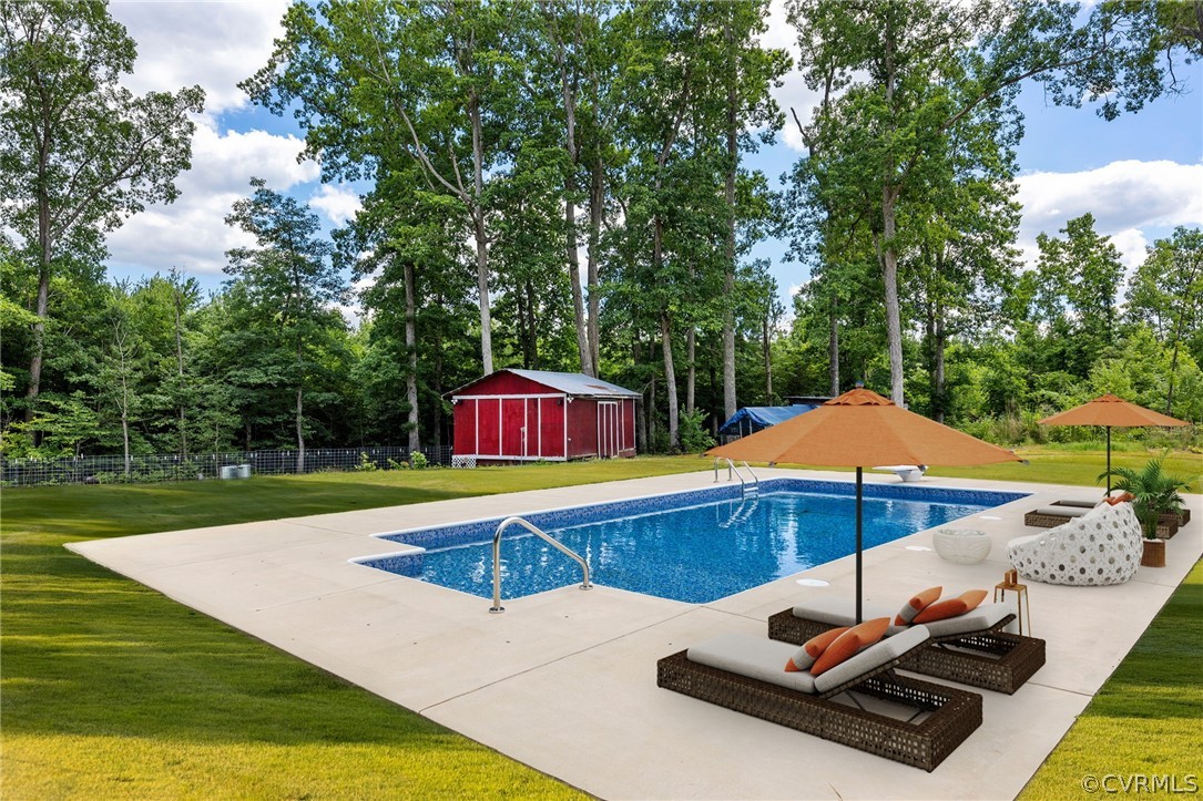 6621 Cox Road Wilsons, VA 23894 - Photo 36 of 44 an outdoor space with pool and furniture