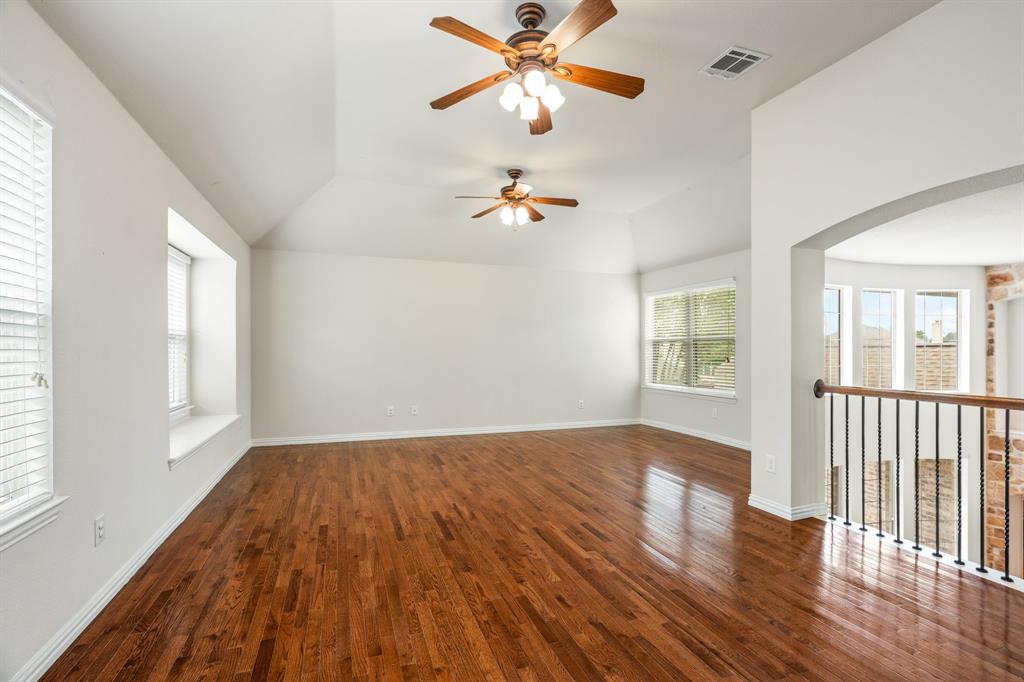 2012 Burnside Drive Allen, TX 75013 - Photo 30 of 40 wooden floor in an empty room with a window